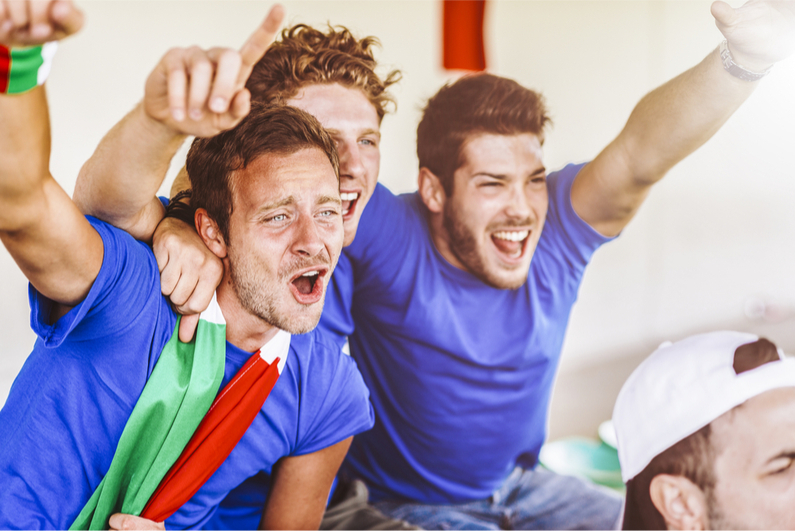 Italian soccer fans cheering at a match