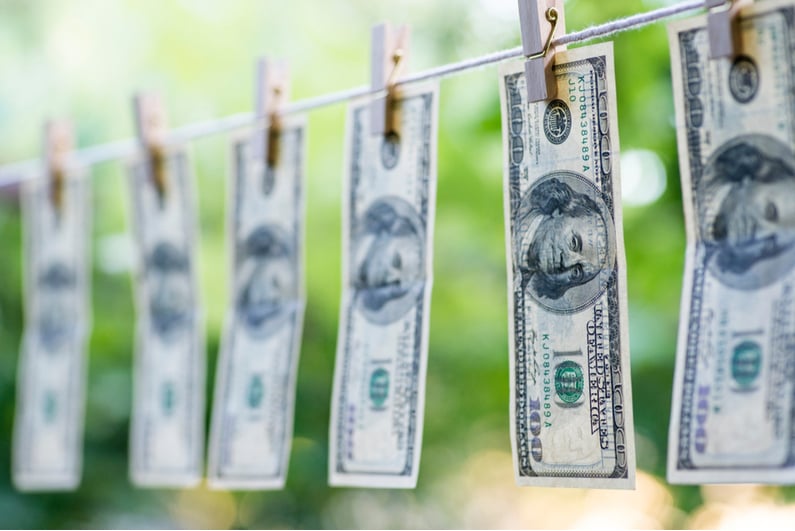 $100 bills hung out to dry