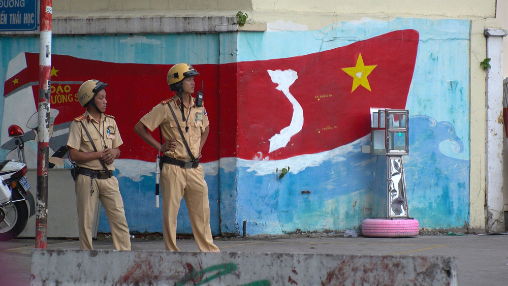 two Vietnamese police officers