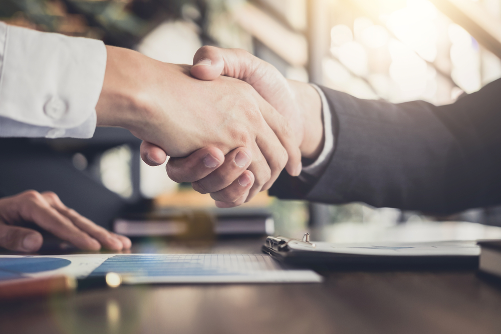 two business people shaking hands