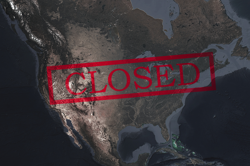 closed sign over a satellite view of the US