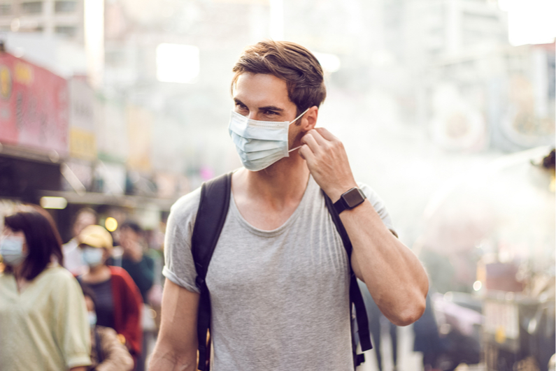 handsome man wearing a protective face mask