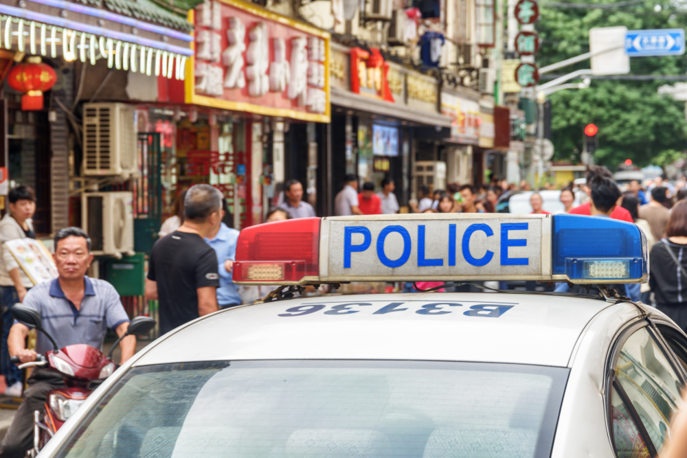 police car in busy Chinese city